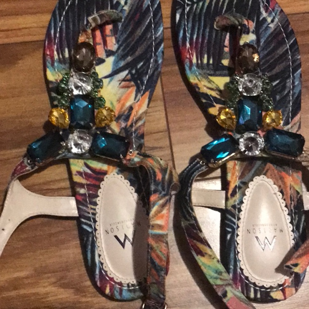 Thong jewel sandals.